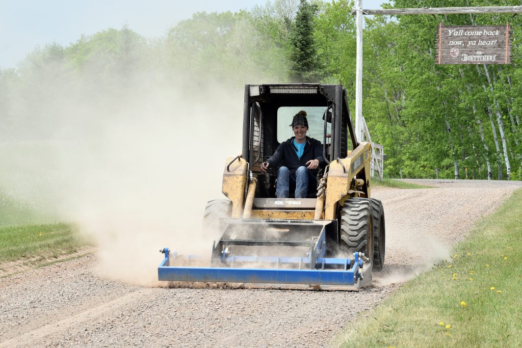 Gravel driveway grader on a John Deere skid steer