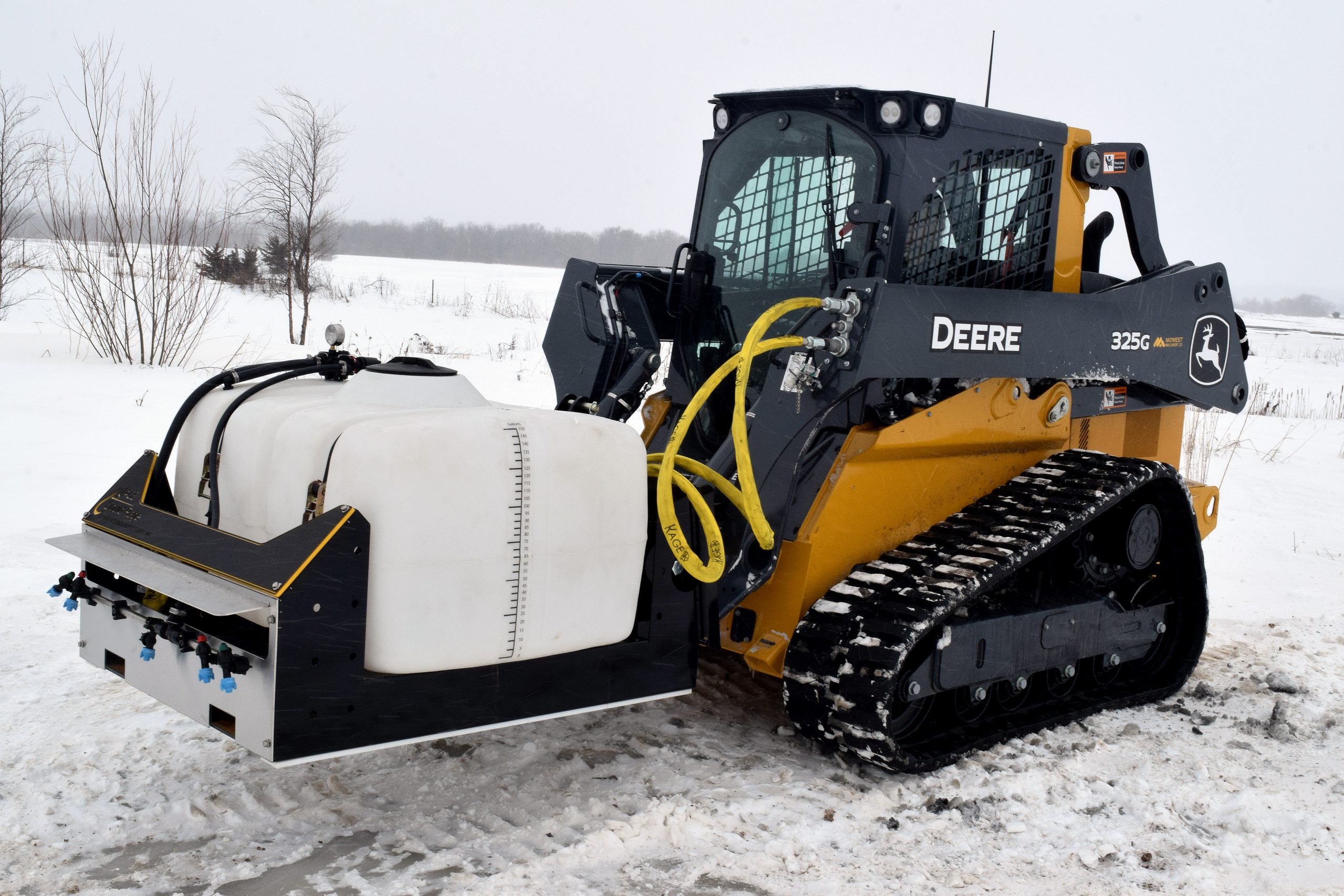 Small batch salt brine sprayer on John Deere Compact Track Loader